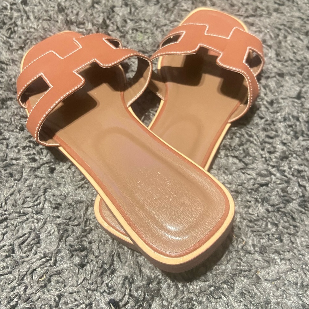 Hermés brown slides/womans good condition.